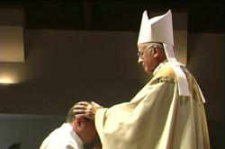 Photo of Fr. Paul Schenck being ordained to the Priesthood by Bishop Victor Galeone. Photos furnished by Michael and Yolanda Moul of Total Magic Video productions in York Pennsylvania. Michael is also the President of the Holy Name Society. Photo of Fr. Paul Schenck being ordained to the Priesthood by Bishop Victor Galeone. Photos furnished by Michael and Yolanda Moul of Total Magic Video productions in York Pennsylvania. Michael is also the President of the Holy Name Society.