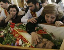Iraqi Christians mourning the loss of one of their beloved priests killed by Muslim extremists Iraqi Christians mourning the loss of one of their beloved priests killed by Muslim extremists