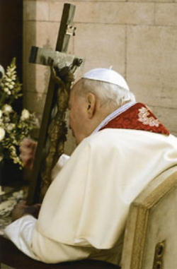 Blessed John Paul II kissing the feet of the Crucified Christ Blessed John Paul II kissing the feet of the Crucified Christ