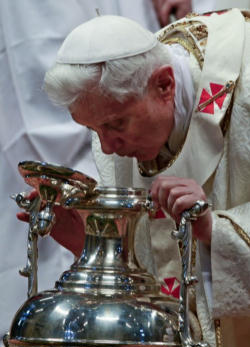 Pope Benedict XVI breathing on the Holy Chrism as a sign of the Holy Spirit Pope Benedict XVI breathing on the Holy Chrism as a sign of the Holy Spirit