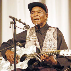 An oral historian of the music genre, David 'Honey Boy' Edwards would tell biographical stories between songs at his shows. He was recorded for the Library of Congress in Clarksdale, Mississippi, in 1942. An oral historian of the music genre, David 'Honey Boy' Edwards would tell biographical stories between songs at his shows. He was recorded for the Library of Congress in Clarksdale, Mississippi, in 1942.
