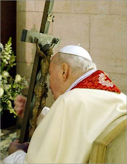 'John Paul II . . . on Good Friday before his death, carried the cross in his hands. The cross. We no longer saw the face of Wojtyla which we saw for many years. We saw only from behind - the image of him and the cross in his hands, because he was a man who really clung to the cross, saying, 'This is the road that will make you free,'' Monsignor Jaroslaw Ceilecki 'John Paul II . . . on Good Friday before his death, carried the cross in his hands. The cross. We no longer saw the face of Wojtyla which we saw for many years. We saw only from behind - the image of him and the cross in his hands, because he was a man who really clung to the cross, saying, 'This is the road that will make you free,'' Monsignor Jaroslaw Ceilecki