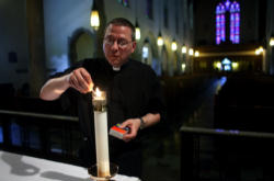 Fr Paul preparing to say Mass Fr Paul preparing to say Mass
