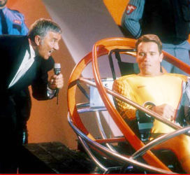 Richard Dawson played a game show host with a far deadlier intent in the comedic science-fiction satire 'The Running Man,' with Arnold Schwarzenegger in 1987. Richard Dawson played a game show host with a far deadlier intent in the comedic science-fiction satire 'The Running Man,' with Arnold Schwarzenegger in 1987.