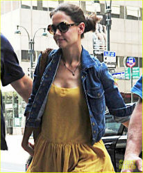 Fleeing her marriage with movie star Tom Cruise, Katie Holmes has relocated to New York City - and rejecting Cruise's Scientology, she has registered with St. Francis Xavier Catholic Church. Fleeing her marriage with movie star Tom Cruise, Katie Holmes has relocated to New York City - and rejecting Cruise's Scientology, she has registered with St. Francis Xavier Catholic Church.