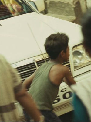 Kianna didn't recognize the landscape speeding past the car's windows - just deteriorating houses, disused markets, abandoned cars and the like. Kianna didn't recognize the landscape speeding past the car's windows - just deteriorating houses, disused markets, abandoned cars and the like.