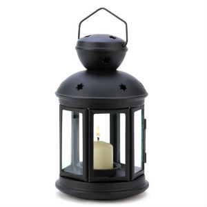 This lamp will do your favorite pillar candle justice, as it looks lovely in the center behind six clear glass panels. This lamp will do your favorite pillar candle justice, as it looks lovely in the center behind six clear glass panels.