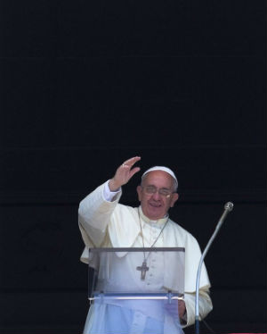 Pope Francis waving during the Angelus address. Pope Francis waving during the Angelus address.