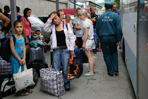 Ukrainian refugees at a Russian train station. Ukrainian refugees at a Russian train station.