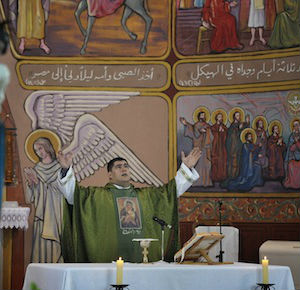 Father Hernandez and three Missionaries of Charity were the only religious left at Holy Family Church during a 50-day battle between Israeli forces and Hamas militants. Father Hernandez and three Missionaries of Charity were the only religious left at Holy Family Church during a 50-day battle between Israeli forces and Hamas militants.