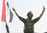 Image of Iraqi forces, backed by Western air power, finally drove ISIS out of the heart of Ramadi earlier this week. Soldiers raised the national flag over Ramadi's government compound to mark the Iraqi military's first major victory against ISIS.