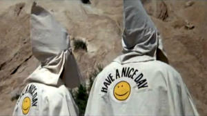 Humble, loving priest or hateful, armed Klansman? Priest's campus appearance sparks emergency