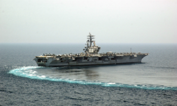 The aircraft Carrier Ronald Reagan (CVN76) performs a turn at sea. The U.S.S. Carl Vinson (CVN 70) is keeping the peace in the Western Pacific at this time. The aircraft Carrier Ronald Reagan (CVN76) performs a turn at sea. The U.S.S. Carl Vinson (CVN 70) is keeping the peace in the Western Pacific at this time.