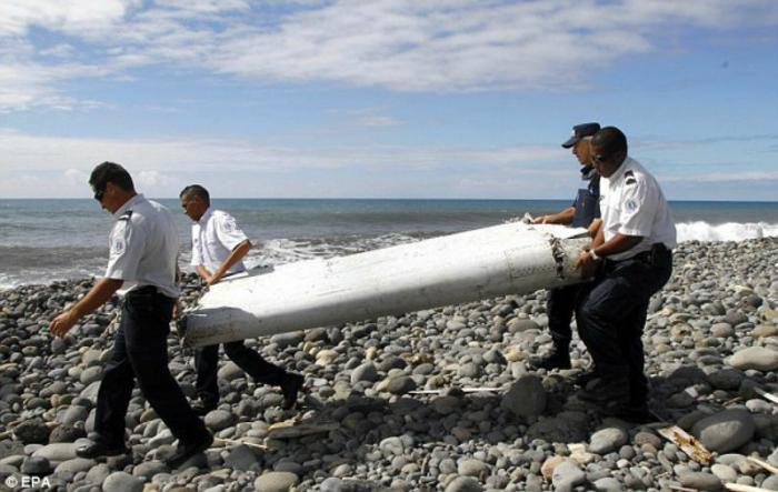 A wing from missing MH370 was recovered on the French Island of Reunion but friends and family continue to insist their loved ones are held captive somewhere.