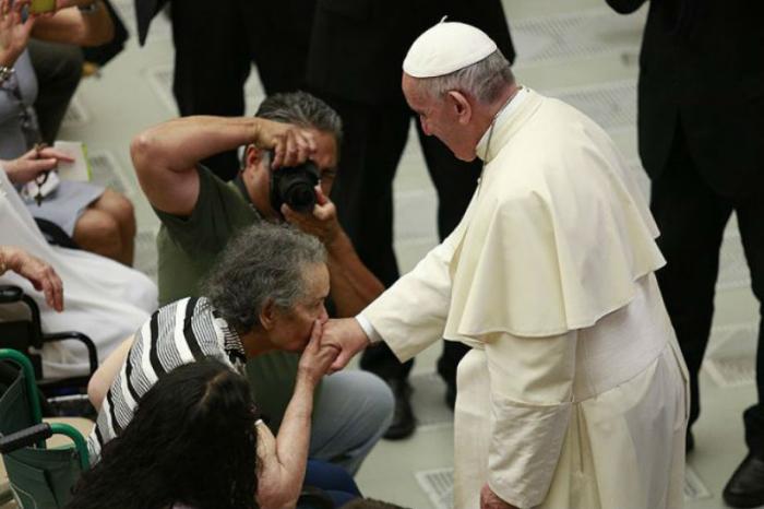 Pope Francis greets the faithful at the General Audience in the Vatican Pope Francis greets the faithful at the General Audience in the Vatican