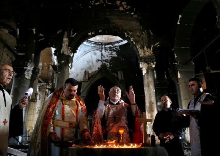 They celebrated Mass in the ruins.