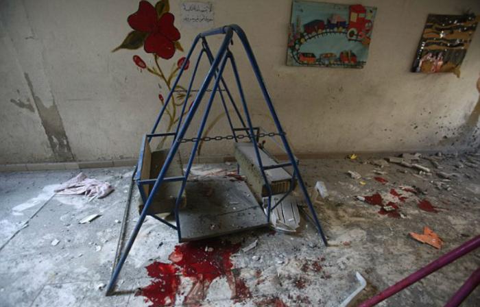 The bloodied play area reveals the heartbreaking attack.