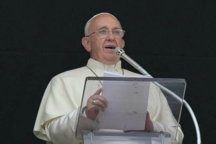 Pope Francis delivers the Angelus address .