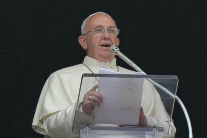 Pope Francis delivers the Angelus address . Pope Francis delivers the Angelus address .