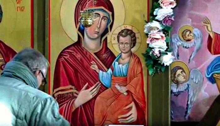 Worshipers worry that the weeping image is a sign of a catastrophe to come. Worshipers worry that the weeping image is a sign of a catastrophe to come.