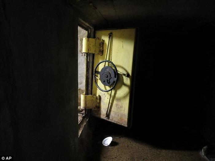 Guzman escaped firstly through an open steel reinforced door leading to a series of interconnected t Guzman escaped firstly through an open steel reinforced door leading to a series of interconnected t