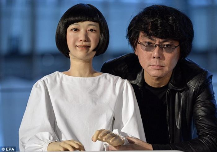 Japanese robotic scientist Hiroshi Ishiguro (right) poses next to girl android robot named Kodomoroi Japanese robotic scientist Hiroshi Ishiguro (right) poses next to girl android robot named Kodomoroi