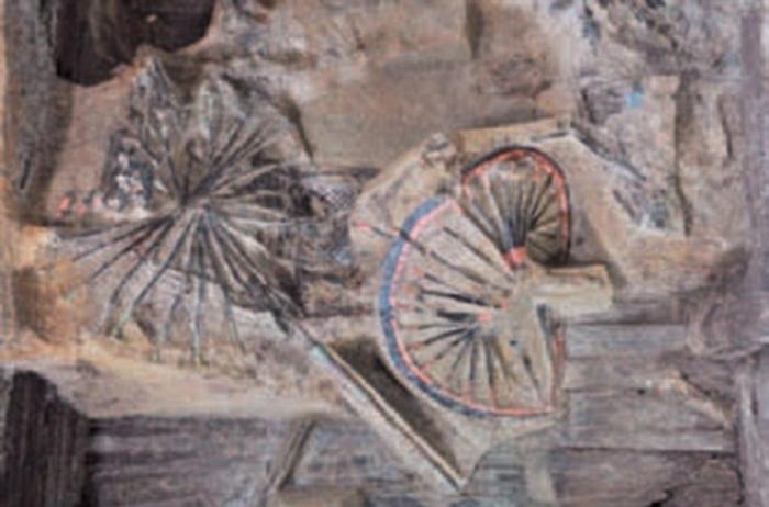 This is an image of a chariot-and-horse pit, made of wood, lacquer, bronze, gold and silver, found i This is an image of a chariot-and-horse pit, made of wood, lacquer, bronze, gold and silver, found i