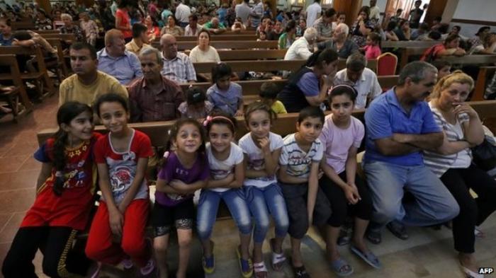 Many of the Iraqi Christians who fled the violence have arrived in the Kurdish city of Erbil. Many of the Iraqi Christians who fled the violence have arrived in the Kurdish city of Erbil.