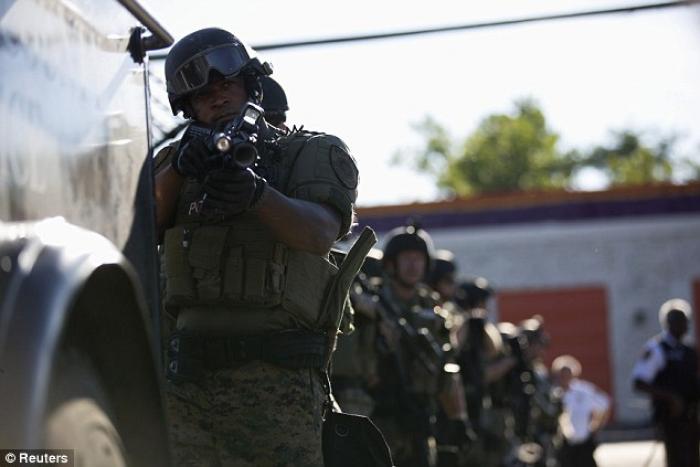 Riots have torn apart the St. Louis suburb of Ferguson. Nightly clashes between protestors and riot Riots have torn apart the St. Louis suburb of Ferguson. Nightly clashes between protestors and riot