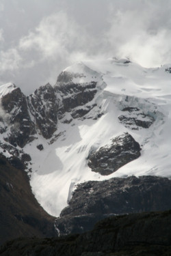 This is a view of the Cordillera Blanca mountain range in Peru in July. Glaciers in the Andean mountains provide a steady source of irrigation and drinking water for communities in the region. Andean glaciers shrank by 10 percent between 1991 and 2002, alarming scientists and others that their continued decline could affect water supplies. (CNS photo/Barbara Fraser) Image of This is a view of the Cordillera Blanca mountain range in Peru in July. Glaciers in the Andean mountains provide a steady source of irrigation and drinking water for communities in the region. Andean glaciers shrank by 10 percent between 1991 and 2002, alarming scientists and others that their continued decline could affect water supplies. (CNS photo/Barbara Fraser)