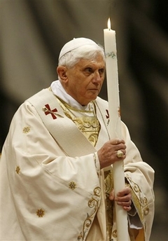Pope Benedict XVI holds a candle during the Easter vigil mass in St. Peter's Basilica, at the Vatican, Saturday March 22, 2008. The pontiff presided over an Easter vigil service late Saturday during which he was to baptize one of Italy's most prominent Muslims. The pope traditionally imparts the sacrament of baptism to several adults during the solemn vigil service, which marks the period between Good Friday, which commemorates Jesus' crucifixion, and Easter Sunday, which marks his resurrection. Image of Pope Benedict XVI holds a candle during the Easter vigil mass in St. Peter's Basilica, at the Vatican, Saturday March 22, 2008. The pontiff presided over an Easter vigil service late Saturday during which he was to baptize one of Italy's most prominent Muslims. The pope traditionally imparts the sacrament of baptism to several adults during the solemn vigil service, which marks the period between Good Friday, which commemorates Jesus' crucifixion, and Easter Sunday, which marks his resurrection.