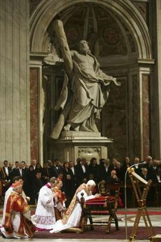 Pope Benedict XVI prays during a Good Friday mass at Saint Peter's Basilica at the Vatican March 21, 2008. Pope Benedict reflected on the persecution of Catholics across the world during a Good Friday procession around Rome's Colosseum that threw the spotlight on suffering among China's faithful. The Pope, who has made improving relations with China one of the goals of his pontificate, presided over the traditional Via Crucis (Way of the Cross) procession commemorating Christ's crucifixion and death. Image of Pope Benedict XVI prays during a Good Friday mass at Saint Peter's Basilica at the Vatican March 21, 2008. Pope Benedict reflected on the persecution of Catholics across the world during a Good Friday procession around Rome's Colosseum that threw the spotlight on suffering among China's faithful. The Pope, who has made improving relations with China one of the goals of his pontificate, presided over the traditional Via Crucis (Way of the Cross) procession commemorating Christ's crucifixion and death.