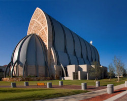Ave Maria Oratory. The 1,100-seat landmark church building that's 104 feet tall and topped with a 10-foot Celtic cross. Image of Ave Maria Oratory. The 1,100-seat landmark church building that's 104 feet tall and topped with a 10-foot Celtic cross.