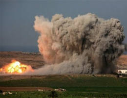 An explosion from an Israeli strike in the northern Gaza Strip is seen from the Israel side of the border with Gaza, Saturday, Jan. 3, 2009. Palestinian militants fired rockets into southern Israel Saturday as Israeli warplanes and gunboats blasted more than two dozen Hamas positions, targeting weapons storage facilities, training centers and homes of leaders as its offensive against Gaza's Islamic militant rulers entered a second week. Image of An explosion from an Israeli strike in the northern Gaza Strip is seen from the Israel side of the border with Gaza, Saturday, Jan. 3, 2009. Palestinian militants fired rockets into southern Israel Saturday as Israeli warplanes and gunboats blasted more than two dozen Hamas positions, targeting weapons storage facilities, training centers and homes of leaders as its offensive against Gaza's Islamic militant rulers entered a second week.