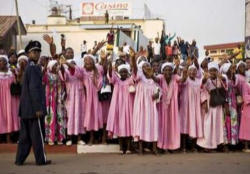 On his second day in the country the pope met with the bishops, accompanied by a celebratory crowd thronging the route of the popemobile. Image of On his second day in the country the pope met with the bishops, accompanied by a celebratory crowd thronging the route of the popemobile.