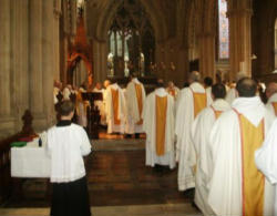 Anglican and Episcopal priests of the Forward in Faith movement process into Liturgy. Image of Anglican and Episcopal priests of the Forward in Faith movement process into Liturgy.