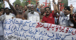 Pakistani Christians protesting the killing of their brethren. Image of Pakistani Christians protesting the killing of their brethren.