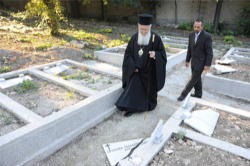 (Photo: Nikos Manginas) Outraged and grieved by what happened, the Ecumenical Patriarch Bartholomew (pictured) went to see the desecrated cemetery, asking why such acts continue to strike Christian graveyards. Image of (Photo: Nikos Manginas) Outraged and grieved by what happened, the Ecumenical Patriarch Bartholomew (pictured) went to see the desecrated cemetery, asking why such acts continue to strike Christian graveyards.