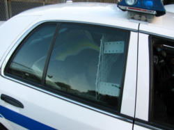 The devotional picture of Jesus used by those praying outside was 'arrested' and placed in the back of a squad car. Image of The devotional picture of Jesus used by those praying outside was 'arrested' and placed in the back of a squad car.