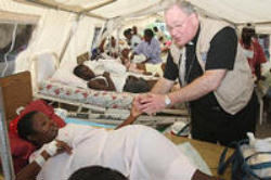 New York Archbishop Timothy Dolan led hundreds of Haitians in a funeral Mass at the ruins of the Notre Dame Cathedral in Port-au-Prince, Haiti on Saturday. Image of New York Archbishop Timothy Dolan led hundreds of Haitians in a funeral Mass at the ruins of the Notre Dame Cathedral in Port-au-Prince, Haiti on Saturday.