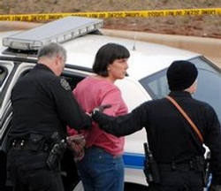 Police take Biology Professor Amy Bishop, 42, into custody after shootings during a tenure meeting at the University of Alabama-Huntsville. Image of Police take Biology Professor Amy Bishop, 42, into custody after shootings during a tenure meeting at the University of Alabama-Huntsville.