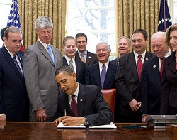 The President signing the Executive Order which received little or no Press coverage. Image of The President signing the Executive Order which received little or no Press coverage.