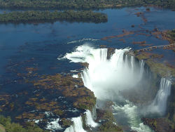 Iguazú Falls is not the world's tallest waterfall by any means. It is easily dwarfed by Niagara Falls. According to the National Geographic, the falls' main drawing power is in 'immensity.' Iguazú Falls is not the world's tallest waterfall by any means. It is easily dwarfed by Niagara Falls. According to the National Geographic, the falls' main drawing power is in 'immensity.'