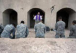 U.S. soldiers of the 1st Battalion, 17th Infantry Regiment, 5th Brigade, 2nd Infantry Division, kneel as Father Carl Subler, a chaplain and captain, celebrates mass in Helmand province, southern Afghanistan, Sunday, Feb. 21, 2010. (AP photo) Image of U.S. soldiers of the 1st Battalion, 17th Infantry Regiment, 5th Brigade, 2nd Infantry Division, kneel as Father Carl Subler, a chaplain and captain, celebrates mass in Helmand province, southern Afghanistan, Sunday, Feb. 21, 2010. (AP photo)