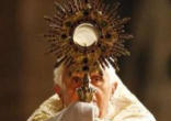Pope Benedict XVI processed with the Exposed Blessed Sacrament into the crowd of pilgrims, imparting a blessing and praying for graces of healing, consolation and mercy. Image of Pope Benedict XVI processed with the Exposed Blessed Sacrament into the crowd of pilgrims, imparting a blessing and praying for graces of healing, consolation and mercy.