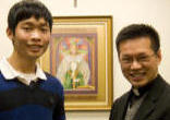 Fr. Dat Hoang presenting an award. Image of Fr. Dat Hoang presenting an award.