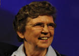 Sr. Carol Keehan waving the pen the President gave her. The act caused what the Bishops call a 'Wound to Catholic Unity'. Image of Sr. Carol Keehan waving the pen the President gave her. The act caused what the Bishops call a 'Wound to Catholic Unity'.