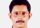 Prof TJ Joseph (pictured, a 'Wanted' poster calling for his capture) has been a college lecturer since 1985. Image of Prof TJ Joseph (pictured, a 'Wanted' poster calling for his capture) has been a college lecturer since 1985.