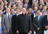 the President of Wyoming Catholic College, Fr. Robert W. Cook, surrounded by happy students. Image of the President of Wyoming Catholic College, Fr. Robert W. Cook, surrounded by happy students.