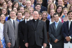 the President of Wyoming Catholic College, Fr. Robert W. Cook, surrounded by happy students. the President of Wyoming Catholic College, Fr. Robert W. Cook, surrounded by happy students.